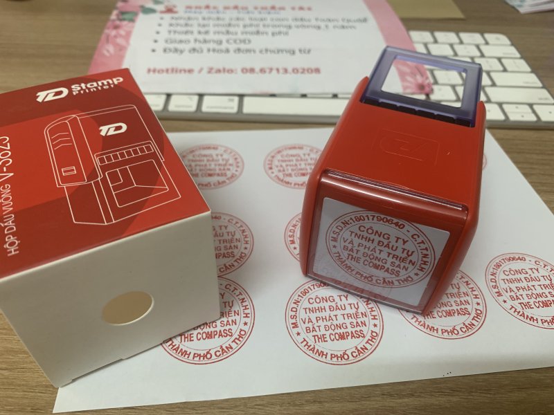 Khắc con dấu tròn cho Công ty TNHH Đầu Tư và Phát Triển Bất Động Sản The Compass
