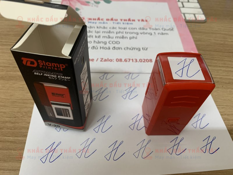 Khắc con <a class=