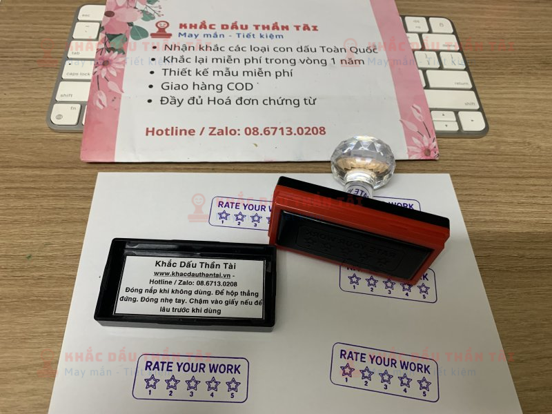 Khắc con dấu cho Giáo viên Trường quốc tế chữ Rate_Your_Work màu tím