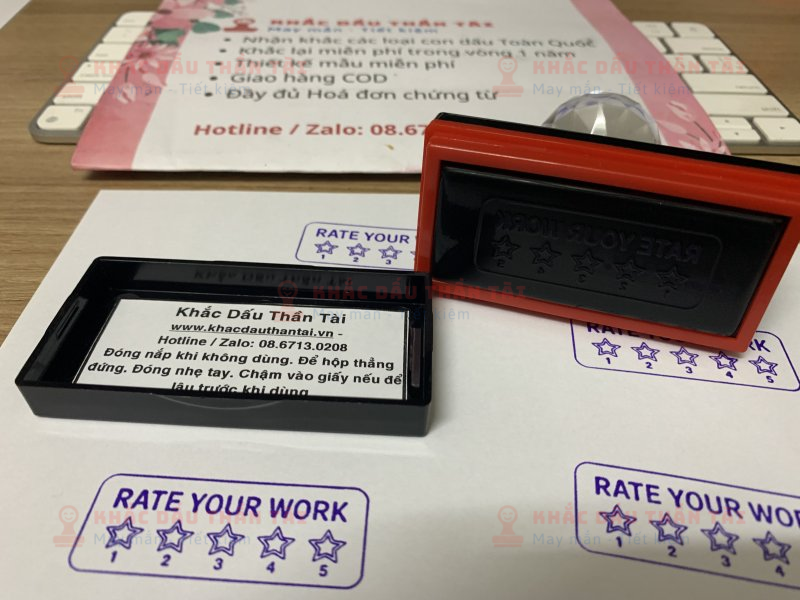 Khắc con dấu cho Giáo viên Trường quốc tế chữ Rate_Your_Work màu tím
