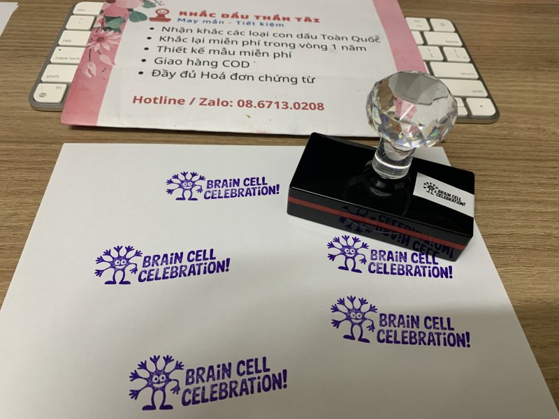 Khắc con dấu cho Giáo viên Trường quốc tế - Chữ Brain_Cell_Celebration - Màu Tím