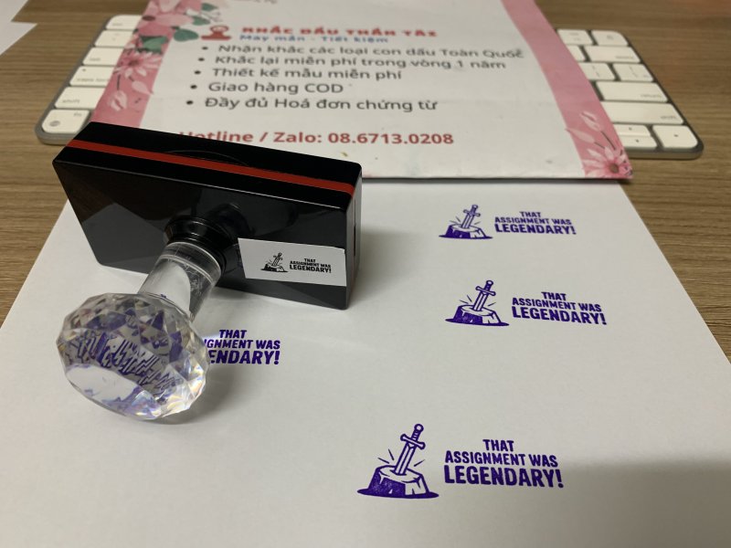 Khắc con dấu Giáo viên Trường quốc tế chữ That Assignment Was Legendary màu tím