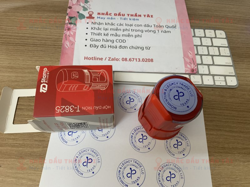 Khắc con dấu cao su logo Công ty Momentum And Lagacy Trade LLC