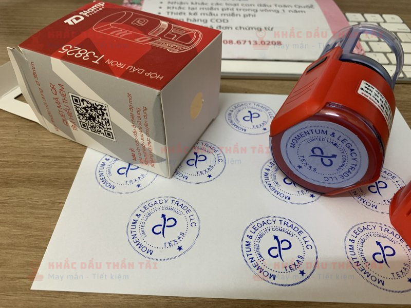 Khắc dấu Cao su con dấu logo Công ty Momentum And Lagacy Trade LLC