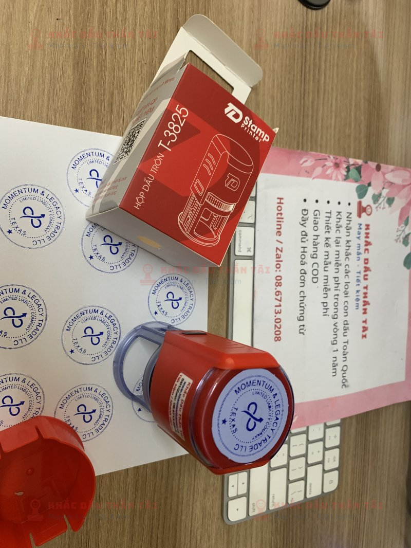 Khắc con dấu cao su logo Công ty Momentum And Lagacy Trade LLC