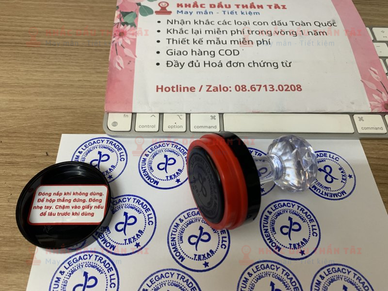 Khắc con dấu Flash logo Công ty Momentum And Lagacy Trade LLC