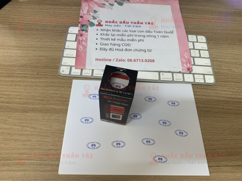 Khắc con dấu Oval XT 32 mực xanh chuyên đóng giấy A4