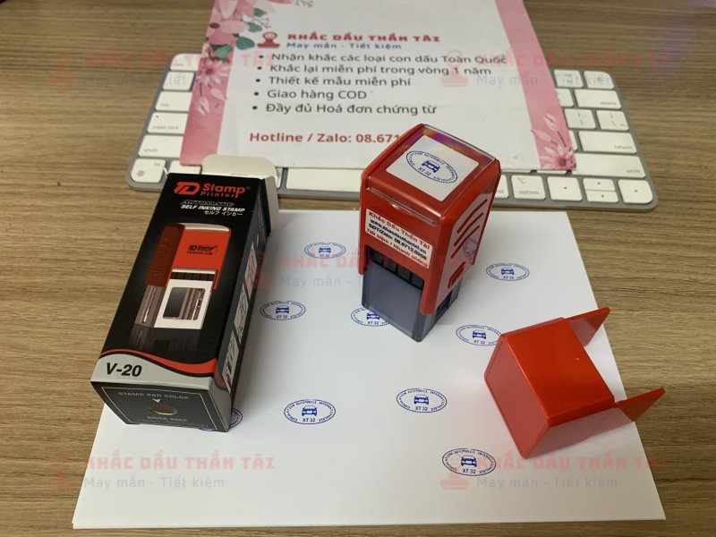 Khắc con dấu Oval XT 32 mực xanh chuyên đóng giấy A4