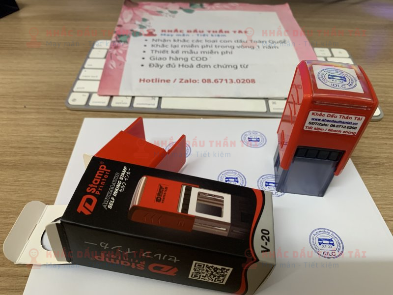 Khắc con dấu tròn Logo Oto IDLC, mực xanh, đóng giấy A4
